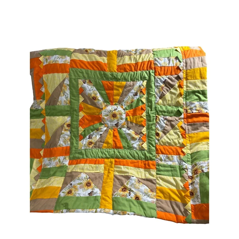 Cheerful,happy, colorful sunflower theme lap quilt or baby quilt. 41” x 40”